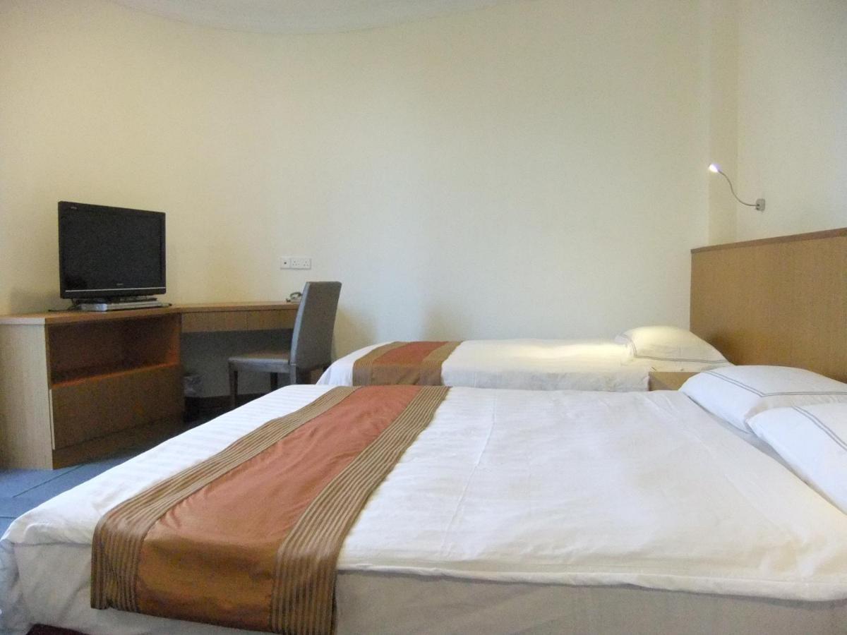 New Cape Inn Сингапур Номер фото